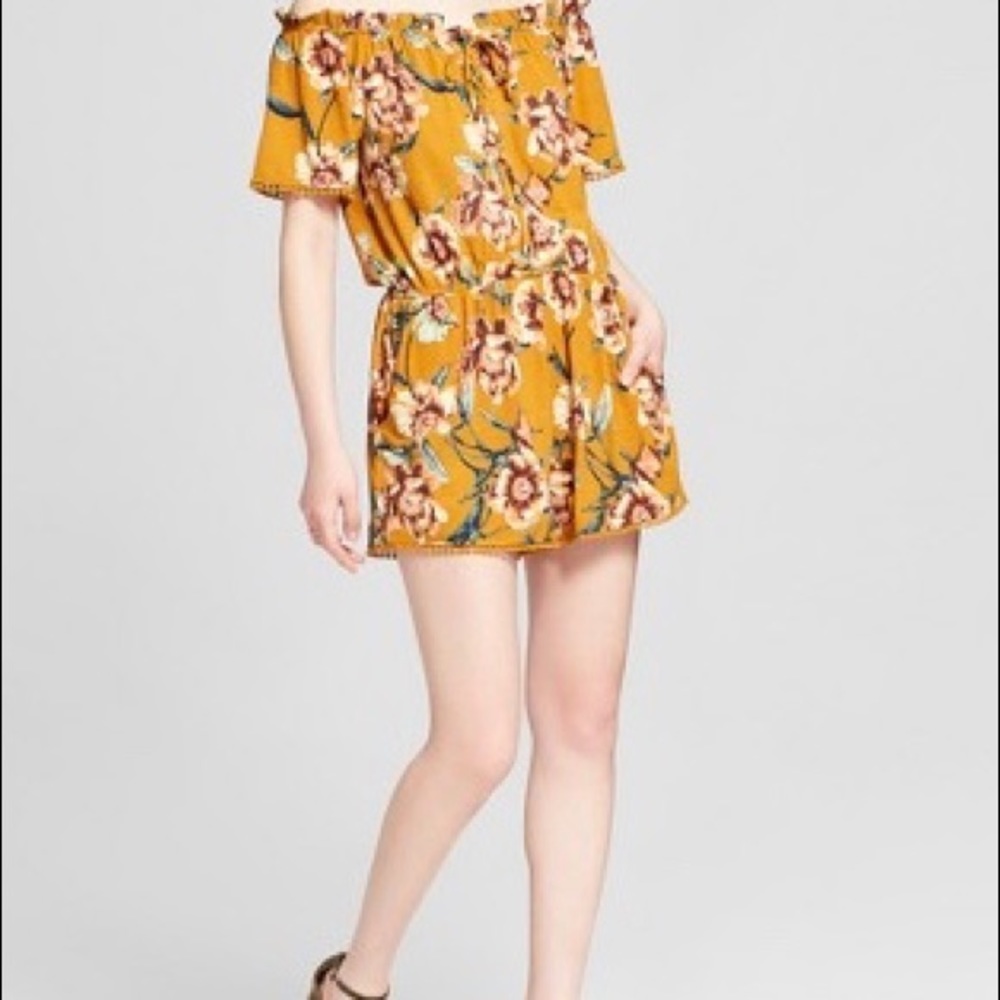 Mustard yellow floral romper w/pom detail nwot